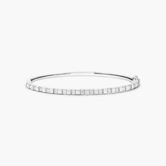 14K White Gold Abyss Lab-Created Diamond Bangle Bracelet. She'll love the anytime appeal of this classic bangle bracelet. Fashioned in 14K white gold, this look showcases a row of lab-created diamonds - each and a brilliant buffed luster, this bangle secures with a single snap clasp. Modern White Bangle For Anniversary, White Gold Bangle Bracelet With Single Cut Diamonds, Classic White Gold Bangle For Anniversary, Classic White Gold Jubilee Bangle, Classic White Sterling Silver Bangle Bracelet, Classic White Bangle Tennis Bracelet, White Classic Bangle Tennis Bracelet, White Classic Tennis Bangle Bracelet, White Diamond Bangle For Anniversary