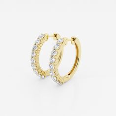 Who doesn't like a pair of classic hoop earrings? This extremely versatile pair can be worn with jeans and a tee, a cocktail dress or at your summer soiree. The high quality lab-grown diamonds shimmer as you move. Classic Halo Hoop Earrings, Classic Diamond Huggie Earrings With Halo, Classic Small Hoop Huggie Earrings With Halo, Yellow Gold Hoop Diamond Earrings With Prong Setting, Classic Yellow Gold Huggie Earrings, Classic Formal Huggie Earrings With Halo, Classic Brilliant Cut Hoop Huggie Earrings, Classic Hoop Earrings With Prong Setting For Formal Occasions, Yellow Gold Hoop Earrings With Brilliant Cut