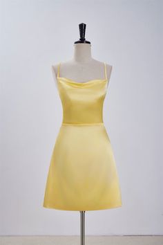 Expertly crafted from satin fabric, this stunning A-line dress boasts a striking cowl neck and delicate spaghetti straps. The back features a lace-up design, while the above knee length adds a touch of elegance to the overall silhouette. Available in a vibrant yellow hue, this dress is sure to make a statement. Item #NP1113 Material: Satin Color: Yellow Silhouette: A-line Embellishment: Cowl neck Neck: Spaghetti straps Back: Lace-up Length: Above knee length Fully lined: Yes Built-in bra: Yes True to size. Made in China. Dresses are usually packed inside out for protection. Hand wash