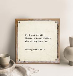 a wooden framed sign with the words, i can do all things through christ who straightens me