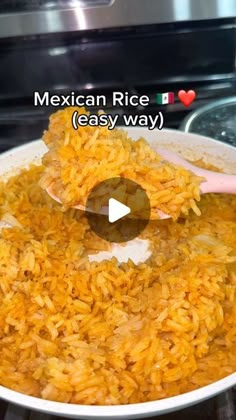 mexican rice is being cooked on the stove