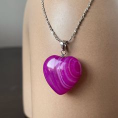 Magenta pink heart pendant. This stone is not only bright and beautiful, but also has some healing powers. The energies of Agate will calm, elevate, and uplift you. Even if you're having a very busy and hard day, you will still be able to relax and find peace and solitude. Also, agate is considered a protective stone. It is believed to attract strength and offer protection from bad dreams, stress and the draining of energy.  This is a great gift for your girlfriend that will show her your feelin Luxury Jewelry Gift, Pink Heart Pendant, Healing Necklace, Bad Dreams, Chakra Jewelry, Pink Agate, Magenta Pink, Agate Jewelry, Bright And Beautiful