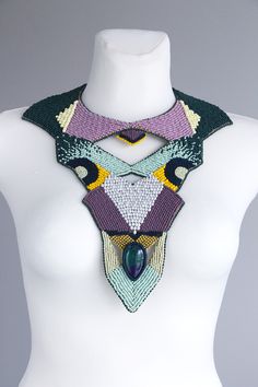 One of a kind multicolor statement necklace. Large collar necklace made only of seed bead and natural multicolor gemstone. The shape and colors of the stone can be slightly different. This is big and bold bead embroidery necklace design, but it is not very heavy at all. Necklace neck size is adjustable for each neck size. The back side of necklace is animal friendly Italian fabric, gentle to your skin. Statement necklace made mostly of mate seed beads color. Colorful and large body necklace desi Multicolor Beaded Crystal Necklaces For Jewelry Making, Unique Crystal Necklaces With Colorful Round Beads, Bohemian Green Necklace, Bohemian Beaded Necklaces With Natural Stones For Party, Multicolor Gemstone Beads For Party, Multicolor Beaded Crystal Necklace For Party, Bohemian Multicolor Bib Necklace With Polished Beads, Unique Multicolor Crystal Necklaces With Colorful Beads, Unique Multicolor Crystal Necklaces