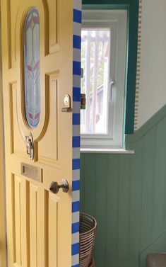 two doors with blue and white stripes on them