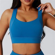 The Clio Sports Bra is here to support you through your toughest workouts. With built in cups and a wide supportive band, it offers full support for even the most intense activities. The unique hollow back cross strap design adds a stylish touch while providing extra support and comfort. Stay comfortable and confident with the Clio Sports Bra. Product Details: 75% Nylon/ 25% Spandex Built in cups Full support for high intensity workouts Wide straps and support band Hollow back cross strap design Sporty Activewear With Light Support And Wide Straps, Gym Sports Bra With Light Support And Sculpting Fit, Sporty Activewear With Wide Straps For Sports, Sporty Activewear With Wide Straps For Gym, Activewear With Built-in Padding And Wide Straps For Workout, Sporty Activewear With Wide Straps, Functional Sculpting Sports Bra With Light Support, Sculpting Sports Bra With Light Support For Gym, Athleisure Sports Bra With Arch Support