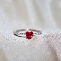 Introducing our Heart Cut Ring, the perfect gift for your loved one this holiday season! With its stunning crushed ice stone, this luxurious ringsparkles and shines like a diamond, adding a touch of elegance to any outfit. The beautiful red heart design symbolizes love and affection, making it an ideal present for Christmass. Treat your special someone to a gift they will cherish forever with our Heart Cut Ring. ✔ Ready to Ship in 1-2 Business Days .. ✔ Shipped to the Worldwide 1-5 business days Sterling Silver Ruby Ring With Vs Clarity For Gift, Ruby Ring With Vs Clarity For Gift, Heart Shaped Lab-created Ruby Jewelry Gift, Ruby Heart Cut Rings For Valentine's Day, Ruby Ring With Diamonds For Valentine's Day Promise, Diamond Ruby Ring For Valentine's Day Promise, Cubic Zirconia Ruby Ring In White Gold As Gift, Valentine's Day Diamond Ruby Promise Ring, White Gold Ruby Ring For Gift