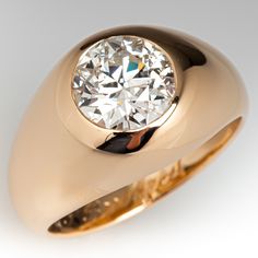 This captivating ring contains one (1), gypsy set, round transitional brilliant cut diamond weighing 2.14 carats. The ring measures 12.9mm at the top, rises 5.8mm above the finger, tapering to 3.8mm wide and 1.5mm thick at the base of the shank. This ring is currently a size 9. Gents Ring Design, Diamon Ring, Jewelry Knowledge, Emerald Cut Diamond Ring, Mens Gold Jewelry, Ring Trends, Gold Rings Fashion, Vintage Diamond Rings, Men Diamond Ring