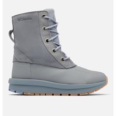 a pair of grey boots with blue laces on the outstep and sole