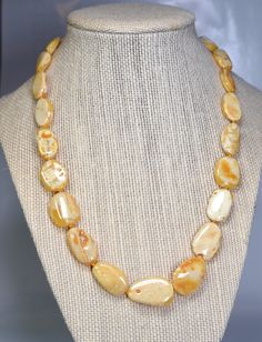 Beautiful Natural Baltic Amber Butterscotch Beads, Swirly Yummy Cloud like, so beautiful they make you float and dream with them! These have Inclusions a plenty! Every Bead is a Work of Art by Nature! So Amazing! 19" in length, Beads are slightly graduated and run from approx 24X14X6mm-12X10X6mm. High Quality Beads perfect for jewelry designers or for wearing! Enjoy! You will receive one Necklace. Made in Lithuania. Jewelry Designers, Baltic Amber, Beads Necklace, Lithuania, So Beautiful, Float, Amber, Jewelry Design, Beaded Necklace