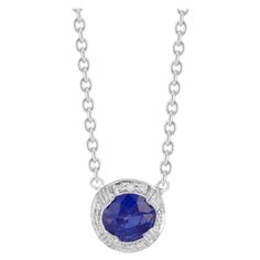 Sapphire and diamond necklace. GIA round sapphire and pave diamond halo pendant necklace. 16 inch platinum cable chain. Sapphire is certified simple heat only. 1 round gem blue fine Sapphire, approx. total weight .88cts, VS, 6.15 x 6.10ct, 39mm, GIA certificate # 5151412600, natural color simple heat only 33 full cut diamonds, approx. total weight .15cts, G, VS2 Platinum 5.8 grams Tested and stamped: pt 950 Chain: 16 inches Chain width: 1mm cable chain Center section width: 8.5mm Top to bottom: Sapphire Necklace With Brilliant Cut Round Pendant, Classic Round Sapphire Diamond Necklace, Sapphire Necklace With Brilliant Cut, Sapphire Round Diamond Necklace In Fine Jewelry Style, White Gold Sapphire Round Cut Necklace, White Gold Sapphire Necklace Round Cut, Sapphire Diamond Necklace Fine Jewelry, Sapphire Diamond Necklace In Round Shape, Sapphire Necklace With Diamond Accents And Round Cut