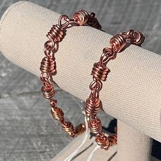 Men's chain link 16 gauge pure copper bracelet with hook closure. Stylish and masculine copper healing bracelet that is comfortable for everyday wear. The natural properties of copper work to relieve issues such as joint pain and inflammation. Copper is also an excellent emf protectant. Many people believe that copper brings positive energy. Please keep in mind copper ages over time and will change color due to everyday wear and environmental contributors. In time patina develops and adds to the Men Copper Bracelet Handmade, Mens Copper Bracelet, Copper Properties, Copper Work, Brass Patina, Emf Protection, Crochet Bracelet, Aging Process, Copper Bracelet