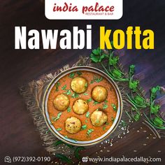 an advertisement for india palace showing food in a bowl on a wooden table with herbs and leaves