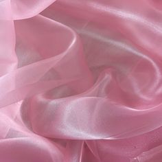 Baby Pink Crystal Organza Fabric by the yard, bulk or wholesale.  Delicately sheer, lightweight, and incredibly soft to the touch, it's the ideal choice for a wide range of projects. Our Light Pink organza fabric is perfect for creating exquisite garments and decorations.  Crafted from 100% polyester, this lightweight fabric offers a sheer and crisp drape, providing strength and elegance in every project. Whether you're designing ball gowns, wedding dresses, blouses, scarves, bridal apparel or fabric roses, organza is the ideal choice for achieving voluminous and structural effects. This baby pink organza fabric is also perfect for event decorations. Whether it's baby shower decor or wedding decorations, the sheer beauty of this organza fabric adds a captivating touch to any setting.  Prod Aesthetic Project, Baby Pink Silk, Bridal Apparel, Wedding Abaya, Lotus Lake, Pink Widget, Pink Collage, Dragonfly Painting, Glossier Pink