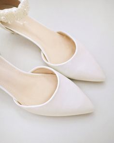 Ivory Satin Pointy Toe Low Heels with Perla Ankle Strap, Bridal Shoes Elegant Pointed Toe Flats For Party, Elegant Pearl Ankle Strap Wedding Shoes, Elegant Pearl Wedding Shoes With Ankle Strap, Elegant Flat Heel Wedding Shoes For Bridal Shower, Formal Pearl Heels With Pointed Toe, Elegant Cream Pointed Toe Flats With Low Heel, Elegant Pearl Wedding Shoes, Elegant Cream Pointed Toe Flats, Elegant Flat Heel Bridesmaid Wedding Shoes