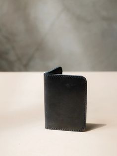 Introducing the ABLE Freddie Card Wallet in sleek black leather. Stay organized and stylish with this functional yet fashionable wallet. Perfect for keeping your cards and cash in one place on-the-go. The Freddie Card Wallet - Modern Trifold Card Holder For Daily Use, Black Bifold Card Holder, Black Rectangular Card Holder With Coin Pocket, Black Bifold Wallet For Daily Use, Modern Wallets With Hidden Phone Sleeve For Daily Use, Modern Bifold Card Holder With Phone Sleeve, Modern Bifold Card Holder With Hidden Phone Sleeve, Black Trifold Wallet With Rfid Blocking For Everyday, Modern Black Wallet For Daily Use