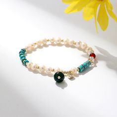 Bohemian Jewelry,This Natural Freshwater Pearl Color Matching Agate Turquoise Bracelet is perfect for any occasion. With its minimalistic design, it is the perfect way to make a subtle statement without being too over the top.This delicate beaded bracelet features a combination of natural freshwater pearl and agate turquoise stones. The bracelet is adjustable and can be tailored to fit any size. Perfect for those who want to keep their jewelry minimalistic yet make a stylish statement. This brac Turquoise Stones, Nature Bracelets, Spiritual Jewelry, Pearl Color, Heart Charm Bracelet, Natural Pearls, Bohemian Jewelry, Turquoise Stone, Minimalist Jewelry