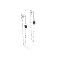 The modern "Mini Cubes & Chain" earrings in a loop design combine simple elegance with sophisticated style. These exquisite earrings are made from high-quality, silver-coloured stainless steel and stylish onyx. A fine stainless steel chain complements the design and gives the earrings a special touch.
Thanks to their timeless design, these earrings are perfect for everyday wear as well as special occasions. They can be perfectly combined with other pieces of jewellery from the COEUR DE LION Lion Earrings, Loop Design, Back Necklace, Crystal Necklace Pendant, Design Ad, Matching Necklaces, Simple Elegance, Gemstone Bracelets, Chain Earrings