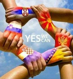 several hands painted in different colors holding each other with the words yes we can above them