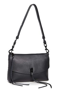 PRICES MAY VARY. WOMEN’S SHOULDER HANDBAGS: The Darren Top Zip Shoulder Purse gives you function, and form all wrapped up in one. Pair the bag with your wardrobe while having striking turn-lock hardware for a stunning look. CRAFTED WITH QUALITY LEATHER: Featuring an attractive and durable build, this 100% leather handbag for women has the perfect construction so you can use it every day as your favorite staple accessory piece. VERSATILE FOR ANY OUTFIT: Wear this women’s purse as a practical crossbody bag or use as a shoulder bag for the versatility you need. The adjustable shoulder strap can extend from 13 to 21-inches to match your desired length. PRACTICAL COMPACT SIZE: This leather purse is 12” in width, 8” in height, and 4” in depth. The spacious interior is fitted with multiple pocket Square Fashion, Female Design, Leather Handbags Women, Purse For Women, Handbag For Women, Black Purse, Black Hardware, Shoulder Purse, Crossbody Purse