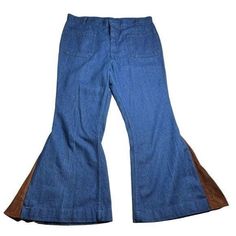 One of a kind modified vintage 1970s sailor Seafarer Utility Trousers Jeans in bright blue lightweight denim (possibly chambray-style, not thick/stiff) that have been modified into bellbottoms with a brown velvety "suede"-feel v-panel. Super high-waisted with zip and hook closure; front and back pockets. Standout OOAK/bespoke statement piece to add to the grooviest of retro hippie festival closets.  Seafarer 65% Cotton | 35% Polyester Estimated size M/L (No tag and have been modified - please review measurements in photos)  *SHORT INSEAM  Approximate flat-lay measurements:  Waist: 17.5" Rise: 13.5" Inseam: 26" Leg-Opening: 14"  Minor signs of wear; no major flaws.  Vintage items are preloved and may display signs of wear as consistent with age and use. Please refer to images as most accura Retro Dark Wash Pants For Spring, Retro Dark Wash Pants For Summer, Retro Medium Wash Spring Pants, Retro Medium Wash Pants For Summer, Retro Medium Wash Pants For Spring, Retro Medium Wash Summer Pants, Medium Wash Retro Summer Pants, Vintage Denim Blue Pants For Summer, Retro Denim Blue Bottoms For Spring