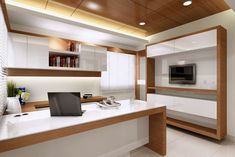 a modern office with white and wood accents