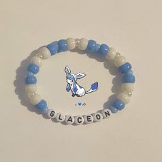 kandi bracelet : blue , cream , beads , scene , emo , scenemo , pokemon , glaceon : #kandi #kandidiy #kandicrafts #kandibracelet Pokemon Kandi Bracelet, Sanrio Kandi Bracelets, Pokémon Bracelet, Scene Kandi Bracelets Ideas, Weird Bracelets, Stuff To Get For Christmas, Pokemon Kandi, Braclets Diy, Blue Kandi