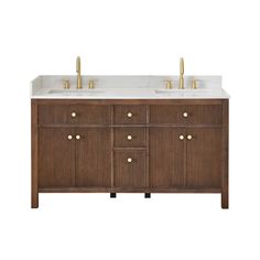 a bathroom vanity with two sinks and gold faucets on the top, against a white background