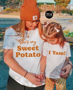 "Sweet Potato Mommy and Me Shirts, Mommy and Me Thanksgiving Outfits Toddler Girl Thanksgiving Shirt, Mother Daughter Shirts Son Child Baby Adult Unisex Tee Choice of Colors: Heather Orange or White Adult Long Sleeve & Adult Sweatshirt options are WHITE only. This listing is for ( 1 ) shirt of your choice: adult unisex tee, adult long sleeve unisex tee, youth tee, toddler tee, baby bodysuit, or baby tee. To order multiples, add your 1st choice to cart & click the title to return to listing and a White Tops With Funny Parenting Text, White Top With Custom Parenting Print, White Tops With Custom Parenting Print, White Top With Custom Print For Parenting, White Tops With Custom Print For Parenting, Playful White Tops For Mother's Day, Cute Tops With Funny Text For Family Events, Cute Tops With Funny Text For Family, Cute Unisex Tops For Family