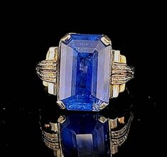 Gorgeous Vintage art deco filigree 18k white rose gold engagement ring blue sapphire in emerald shape circ 1920's center natural sapphire weight 9.86ct. GIA cert laboratory ,Size 14.1x9.2mm very nice quality sapphire,Very nice rich medium blue color ,clean , very lively.the setting is gorgeously and tremendously old ring in excellent condition. ring size 8 Resizable Retail value $18,500 net. Appraisal available Collectible Art Deco Sapphire Ring, Blue Art Deco Jewelry Stamped 14k, Art Deco Sapphire Jewelry With 17 Jewels, Sapphire Art Deco Jewelry With 17 Jewels, Blue Sapphire Ring With Rose Cut Diamonds, Emerald Cut, Art Deco Blue Rings With Rose Cut Diamonds, Art Deco Blue Rose Cut Diamond Rings, Art Deco Sapphire Ring With Baguette Cut, Art Deco Sapphire Baguette Cut Ring