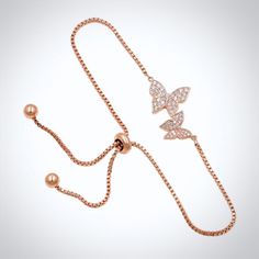 Butterflies represent a passionate bond and endless love. Perfect for a butterfly-themed wedding, this delicate bracelet is an ideal accessory for the minimalist bride, or can make a thoughtful gift for your young bridesmaids or flower girls. Adorned with flawlessly faceted cubic zirconia, it captures the light from every angle with a perfectly translucent appeal, sparkling beautifully. All it takes is a simple glance at this beautiful design to see its extremely subtle and classy look that make Elegant Mother's Day Party Charm Bracelet, Gift Jewelry With Adjustable Length And Cubic Zirconia, Elegant Adjustable Chain Bracelet For Mother's Day, Adjustable Rose Gold Charm Bracelet, Elegant Cubic Zirconia Chain Bracelet For Gift, Elegant Charm Bracelet With Adjustable Length, Adjustable Butterfly Charm Bracelet For Gift, Adjustable Bracelets With Butterfly Charm As Gift, Adjustable Butterfly Charm Bracelets For Gifts