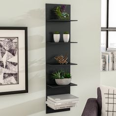 a corner shelf with some plants on it