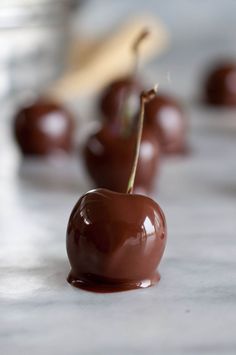 chocolate covered cherries sitting on top of a counter