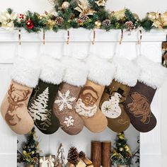 stockings hanging from a mantel decorated with christmas decorations and ornaments, along with pine cones