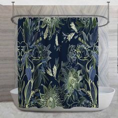 a shower curtain with blue and green flowers on it