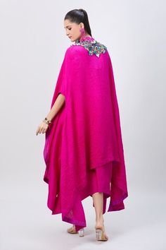 Rani pink asymmetric tunic with multi colored embellished yoke and tassel drops. Comes with matching tasseled and corded crushed cape. - Aza Fashions Designer Cape Dress, Embroidered Cape Dress, Cape Shape Festive Kaftan, Fitted Pink Kaftan, Cape Women, Cape For Women, Asymmetric Tunic, Rani Pink, Pink Tassel