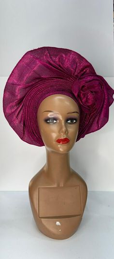 Discover the Elegance of Pre-Tied Auto Gele Step up your style game with our exquisite Pre-Tied Auto Gele, designed for the modern woman who values tradition and convenience. Our auto gele combines the beauty of traditional Nigerian headwraps with the ease of modern fashion, making it the perfect accessory for any occasion. Key Features: 📍Effortless Elegance: Enjoy the sophistication of a perfectly tied gele without the hassle. Our pre-tied design saves you time while ensuring you look flawless. 📍Premium Quality: Made from high-quality Nigerian fabrics, including Yoruba Asooke Fabric and African gele fabric, our auto gele maintains its shape and beauty wear after wear. 📍Versatile Styles: Choose from a variety of colors and patterns to match any outfit, such as red Aso-Oke gele and wine Pink Headband Headscarf For Beach, Pink Headband Headscarf For The Beach, Multicolor Party Headscarf, Adjustable Purple Headband, Adjustable Turban With Matching Headband As Gift, Adjustable Bonnet For Party, Pink Bonnet One Size Fits Most, Adjustable Party Bonnet, Elegant Adjustable Headscarf For Beach