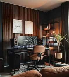 a home office with leather furniture and wood paneling