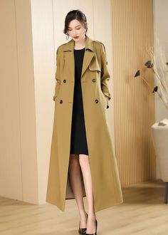 This trench coat is the perfect way to add a unique flair to your wardrobe! Featuring shoulder epaulets and a double-breasted button closure, it'll keep you stylish and cozy. Plus, with a belted waist and long length, you'll look super chic and put-together. Front double-breasted closure Notched lapels Removable tie belt Lined Polyester Women's trench coat Machine wash, dry flat Item #3102805 Size info XS=US2=UK6=EU32 S=US4-6=UK8-10=EU34-36 M=US8-10=UK12-14=EU38-40 L=US12=UK16=EU42 ★★ It would b Double-breasted Long Coat For Fall, Double-breasted Pea Coat For Office In Fall, Double-breasted Pea Coat For Fall Office Wear, Spring Double-breasted Wool Coat, Single-breasted Long Khaki Outerwear, Long Single-breasted Khaki Outerwear, Khaki Long Single Breasted Outerwear, Long Khaki Single-breasted Outerwear, Double-breasted Fall Outerwear