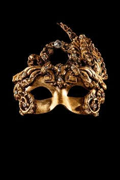 Dama authentic venetian mask in paper mache with a unique baroque style and jewels. This item is strictly handcrafted in Venice, Italy by the famous artists of the city according to the carnival tradition. Each item comes with certificate of authenticity. Luxury Artistic Mask For Carnival, Venetian Baroque Masks For Theater, Formal Venetian Baroque Masks And Prosthetics, Venetian Masks For Theater And Mardi Gras, Artistic Masquerade Mask For Mardi Gras Carnival, Artistic Formal Masks For Mardi Gras, Venetian Baroque Mask For Carnival, Venetian Baroque Masks For Masquerade, Venetian Baroque Masks For Carnival