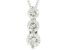 1.50ctw round white lab-grown diamond, rhodium over 14k white gold 3-stone pendant. Measures approximately 5/8"L x 3/16"W and has a 1mm bail. Comes on an 18" cable chain with  2 jump rings allowing the necklace to be worn at 17" or 16", and has a lobster claw clasp closure. Near colorless, eye clean. Three Stone Round Diamond Necklace, Diamond White Three Stone Diamond Necklace, Three Stone Cubic Zirconia Diamond Necklace, Diamond White Three Stone Round Necklace, Three Stone Round Cut White Gold Diamond Necklace, White Gold Three Stone Round Cut Diamond Necklace, Three-stone Cubic Zirconia Diamond Necklace In White Gold, Diamond White Three-stone Cubic Zirconia Necklace, Diamond White Cubic Zirconia Three Stone Necklace