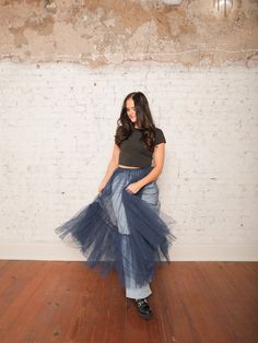 Our Yvonne Tulle Skirt is the ultimate statement piece for layering! With its high-rise elastic waistband and sheer, layered tulle, this midi skirt adds a dreamy touch to any outfit. Pair it with a fitted top and heels for a standout evening look, or wear it over jeans for an edgy daytime vibe. Details High Rise Pull-On Style Elastic Waistband Sheer Layered Tulle Midi Length Size recs: 0-4 Small, 4-6 Medium, 8-10 Large Provides lots of stretch Chic Stretch Tulle Maxi Skirt, Chic Stretch Tulle Skirt Bottoms, Sheer Tulle Skirt For Spring, Spring Sheer Tulle Skirt, Chic Tulle Lined Maxi Skirt, Stretch Full Tulle Maxi Skirt, Chic Relaxed Tulle Maxi Skirt, Spring Stretch Tulle Maxi Skirt, Fall Pleated Tulle Skirt