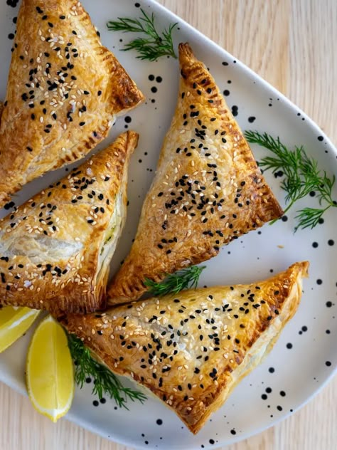 Spinach and Feta Triangles Recipe | Simple Home Edit Mushroom Turnovers, Savory Baking Recipes, Puff Pastry Ideas, Scallops And Shrimp, Sesame Seeds Recipes, Bay Scallops, Savory Baking, Asian Side Dishes, Pastry Ideas