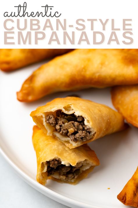 A beef filled cuban empanadas made with homemade empanada dough with more empanadas on the same plate with the words "authentic cuban-style empanadas" in the foreground Cuban Empanadas Recipe, Cuban Empanadas, Cuban Rice And Beans, Beef Picadillo, Pumpkin Flan, Empanada Dough, Cinnamon Simple Syrup, Guava Paste, Empanadas Dough