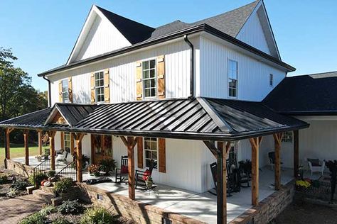 Black Metal Roof Farmhouse White Siding, Back Porch With Metal Roof, Tin Roof Front Porch Addition, Metal Roof On Porch, Metal Roof Historic Home, White Brick House Metal Roof, Metal Covered Porch, White House With Charcoal Metal Roof, White House With Copper Metal Roof