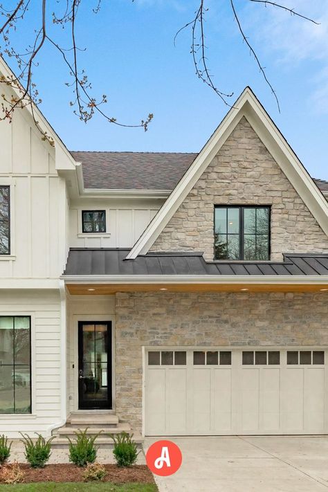 Modern farmhouse with white walls, stone accents, and brick veneer siding, showcasing a blend of rustic charm and contemporary design. Red Brick House With White Siding, Brick House With White Siding, House With White Siding, Brick And Vinyl Exterior, White Brick House Exterior, Exterior Brick Veneer, Brick Veneer Siding, Brick Siding, White Siding