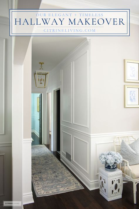 An elegant and timeless hallway makeover featuring gorgeous wall moldings, a stunning oushak runner, bright white paint and beautiful statement lighting! A few simple details help take this space from dark and boring to bright and sophisticated! See more here: https://citrineliving.com/hallway-makeover-reveal/ Grandmillenial Hallway, Hallway Wayne’s Coating, Hallway Molding Ideas Wall, Hallway Box Molding, Batten Board Hallway, How To Decorate A Small Hallway, Foyer Molding Ideas, Entry Way Molding Entryway, Picture Frame Molding Hallway