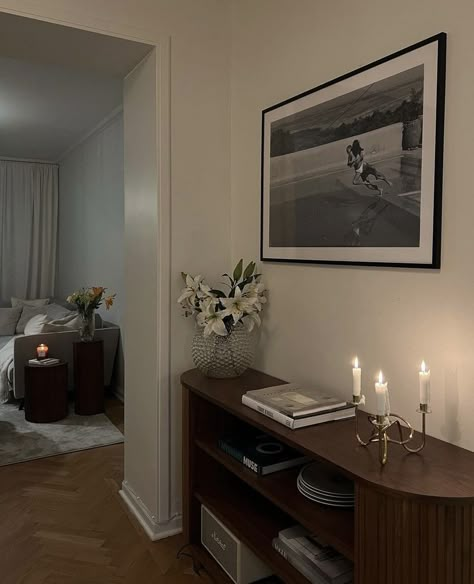 Armchair Bedroom Aesthetic, City Chic Apartment, Decorating Around A Radiator, Vintage Chic Apartment, Midcentury Modern Apartment Aesthetic, Dark Wood Apartment Decor, Nyc Studio Apartment Layout, Nightstand Decor With Lamp, Copenhagen Living Room