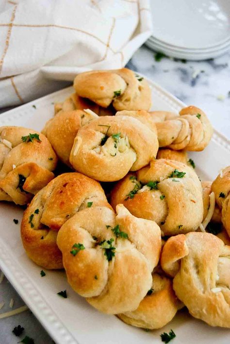 Crescent Roll Garlic Knots | Front Range Fed Garlic Bread Out Of Crescent Rolls, Crescent Roll Recipes Garlic Knots, Garlic Butter Crescent Roll Recipes, Cresent Roll Garlic Knots Easy Recipes, Crescent Garlic Rolls, Garlic Crescent Rolls Pillsbury, Leftover Crescent Roll Recipes, Crescent Roll Bites, Crescent Roll Breadsticks