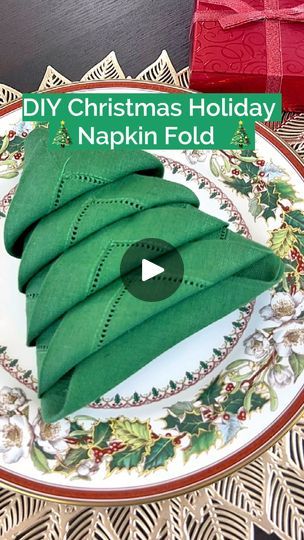 24K views · 433 reactions | Bring holiday cheer to your dinner table with this step-by-step DIY Christmas tree napkin fold! A super easy, yet stylish way to amp up your holiday table decorations. #athomewithreplacementsltd #diydecor #holiday #napkinfolding #diynapkinfold #festivediy #christmasdecorideas #christmas #tableware #maximalism #grandmillenial #tablewareset | Replacements, Ltd. Christmas Tree Napkin Folding Tutorials, Napkin Folding For Christmas Table, Napkin Folds For Christmas, Small Napkin Folding Ideas, How To Fold Table Napkins With Ring, Fancy Napkin Folds, Fold Napkins Christmas, Folding Christmas Napkins, Table Napkin Folding Step By Step