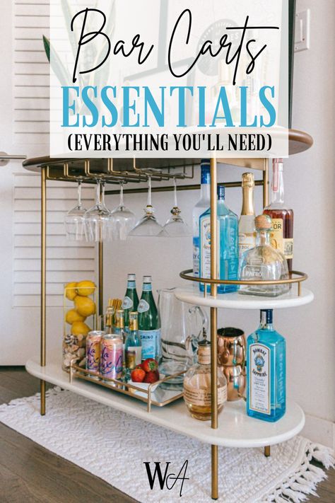 Get ready to impress your guests with a stylish and functional bar cart, complete with these essentials. Small Bar Cart, College Apartment Checklist, Bar Cart Inspo, Drinks Cart, Bar Cart Essentials, Cocktail Bar Cart, Coffee Bar Cart, Apartment Bar, Drink Tray